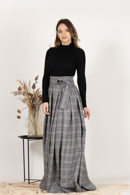 Front view emphasizing the high waist of Plaid Wool Pleated Skirt with Ultra High Waist and Bow