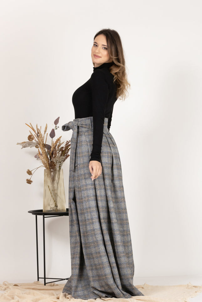Side view of Plaid Wool Pleated Skirt with Ultra High Waist and Bow showing the maxi length