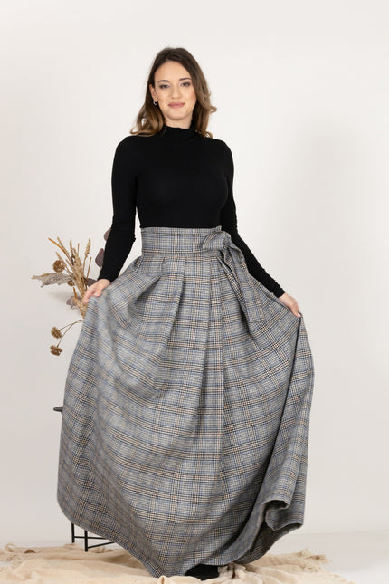Front view showcasing A-line, flared silhouette of Plaid Wool Pleated Skirt with Ultra High Waist and Bow