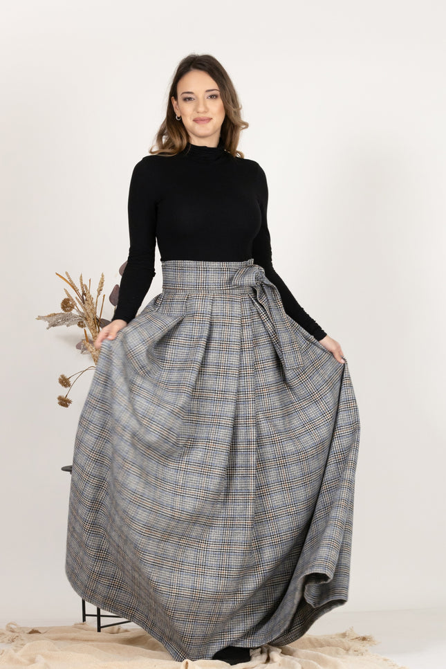 Front view showcasing A-line, flared silhouette of Plaid Wool Pleated Skirt with Ultra High Waist and Bow