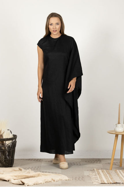 Model wearing the Extravagant Linen Dress with Batwing sleeves, front view displaying the stylish and airy look.