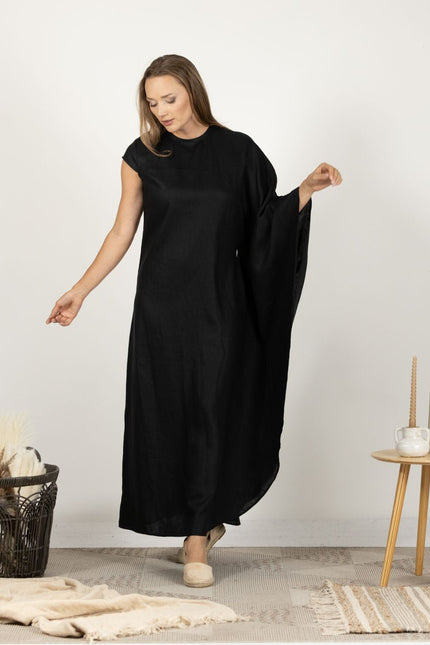 Front-facing image of the Extravagant Linen Dress with Batwing sleeves, highlighting the unique and sophisticated design.