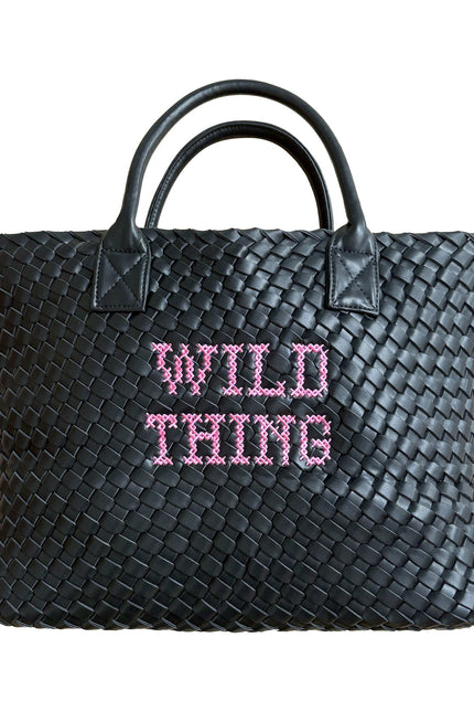 Wild Thing vegan woven handbag by Lilly Loves featuring a colorful, handcrafted woven design with a sturdy leather strap.