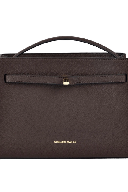 Brown handbag with a visible brand logo on a white background