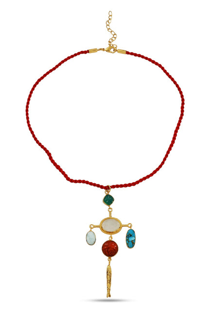 Necklace with red cord and colorful pendant on a white background