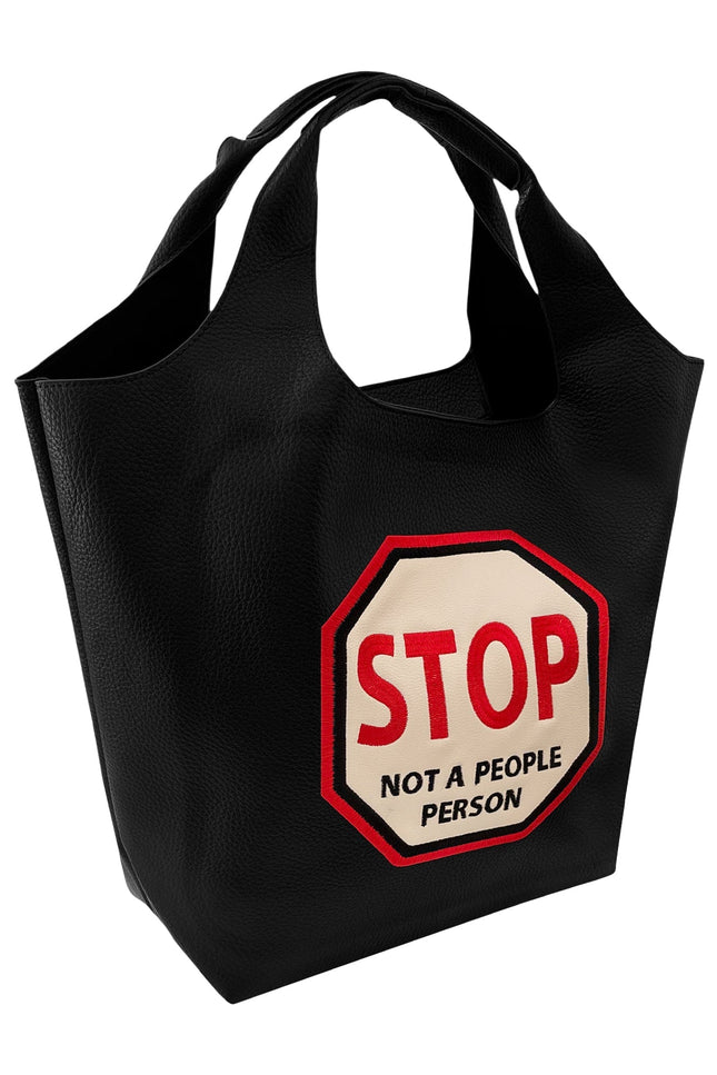 Lilly Loves STOP Not A People Person handbag in black leather with gold hardware, featuring a structured design and top handle.