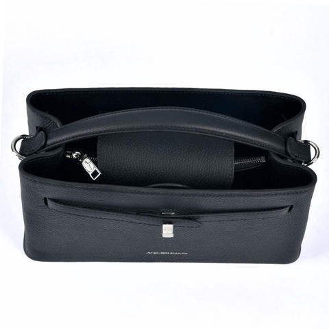 Black atelier galin cube lock handbag with silver hardware and brand logo top view