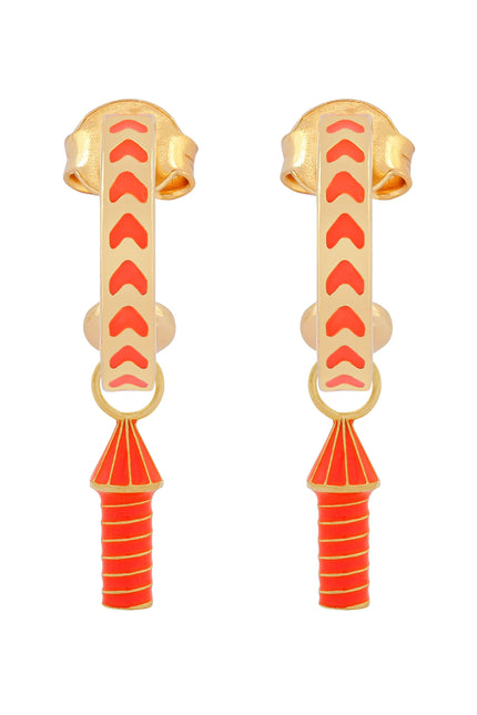 image of rocket enamel earrings in orange and gold on white background