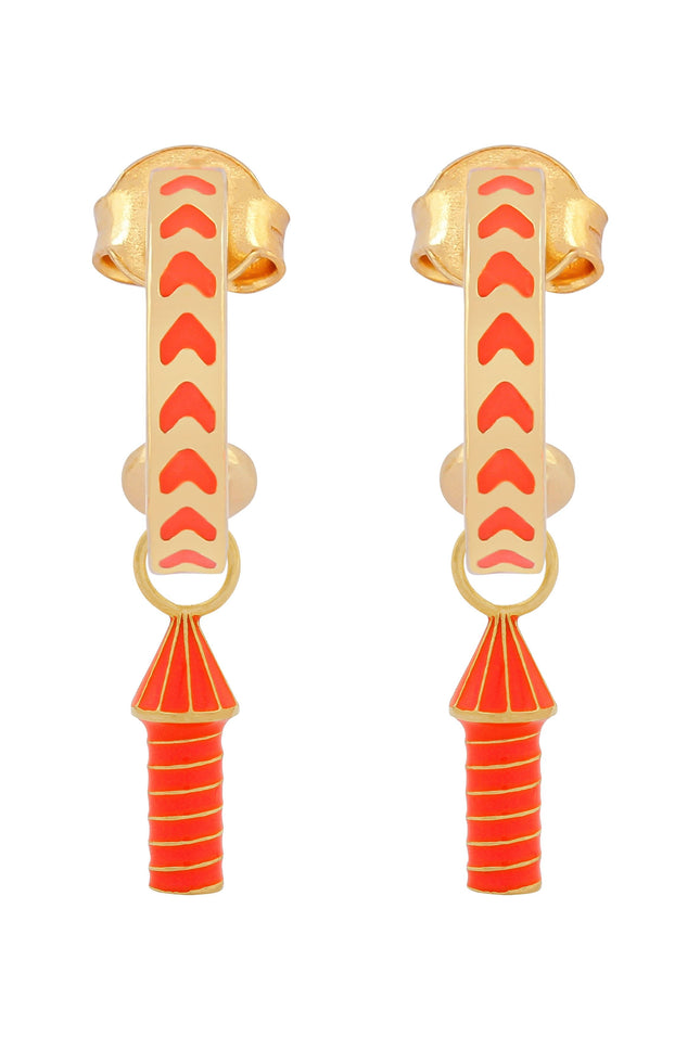 image of rocket enamel earrings in orange and gold on white background