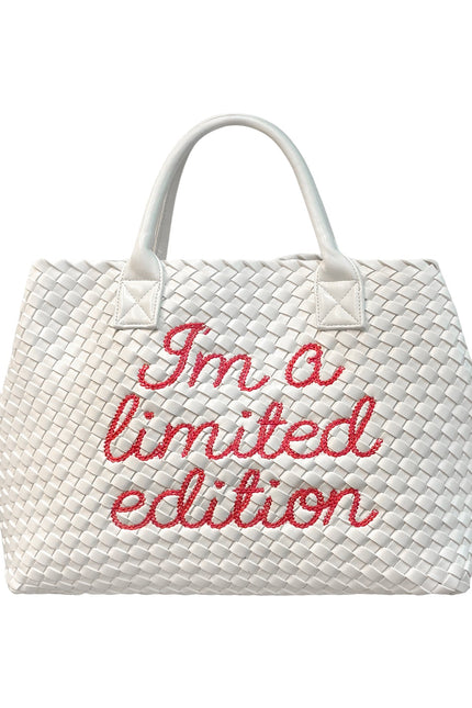 Lilly Loves limited edition white handbag with sleek design, featuring a stylish handle and minimalist aesthetic.