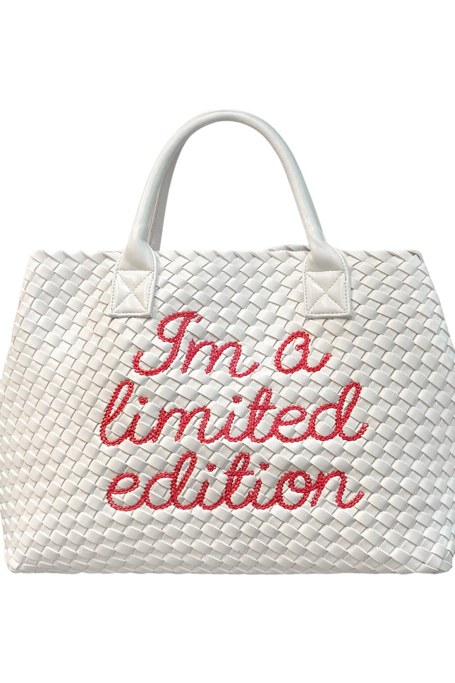 Lilly Loves limited edition white handbag with sleek design, featuring a stylish handle and minimalist aesthetic.