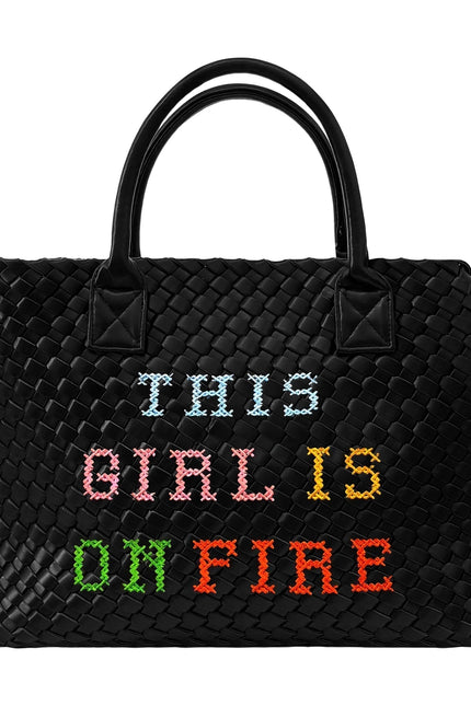 Lilly Loves "This Girl Is On Fire" handbag featuring vibrant orange and black design with stylish handles.