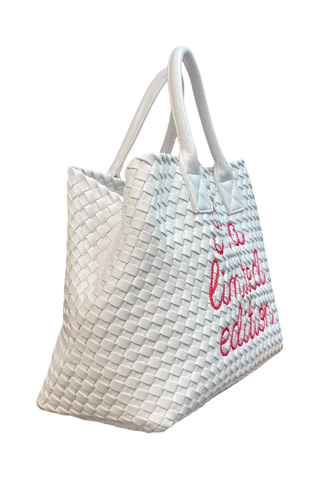 Limited edition white Lilly Loves handbag with sleek design, featuring a structured shape and stylish handles.
