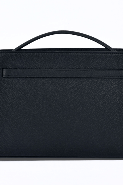 Black atelier galin cube lock handbag with silver hardware and brand logo back view