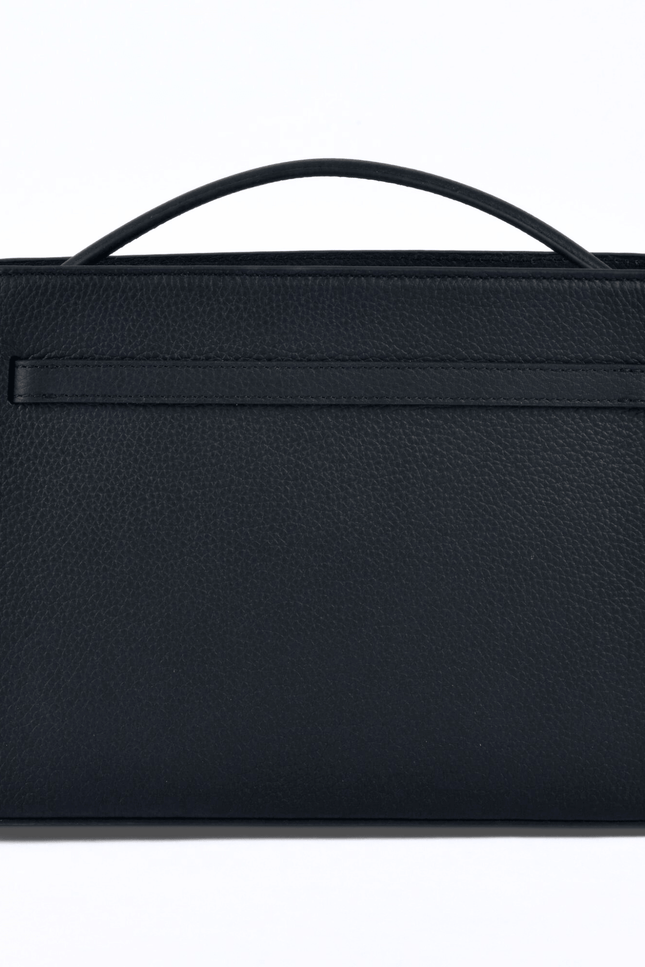 Black atelier galin cube lock handbag with silver hardware and brand logo back view