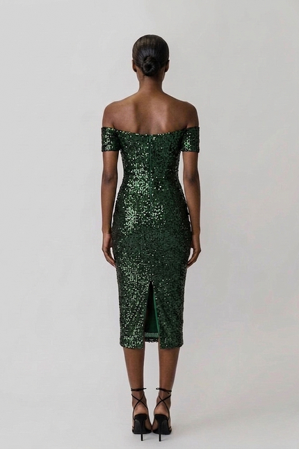 Green sequin off-shoulder dress on a white background