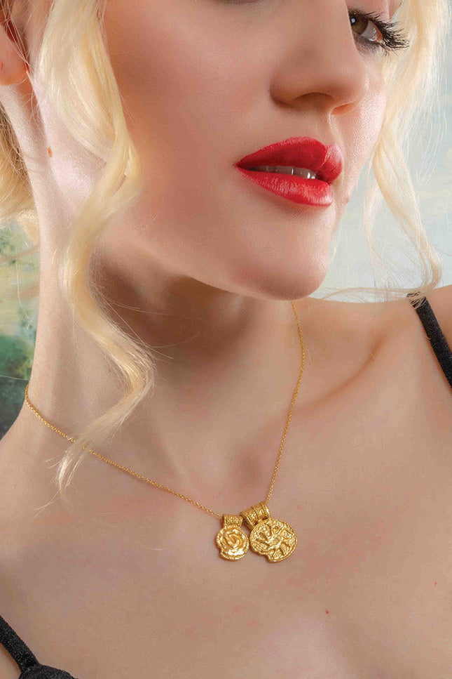 Close up model image of Ancient Symbols Charm Necklace by arvino