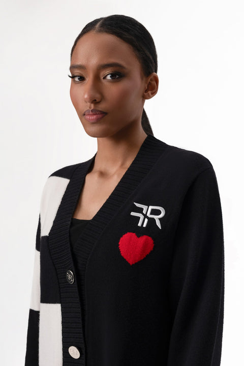 Immerse yourself in the epitome of sophistication with Freisi V-Neckline Cardigan