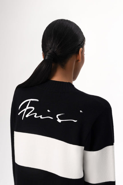 Immerse yourself in the epitome of sophistication with Freisi V-Neckline Cardigan