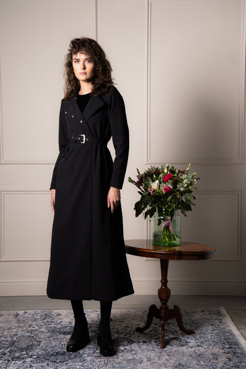 black waterproof coat in A-line cut