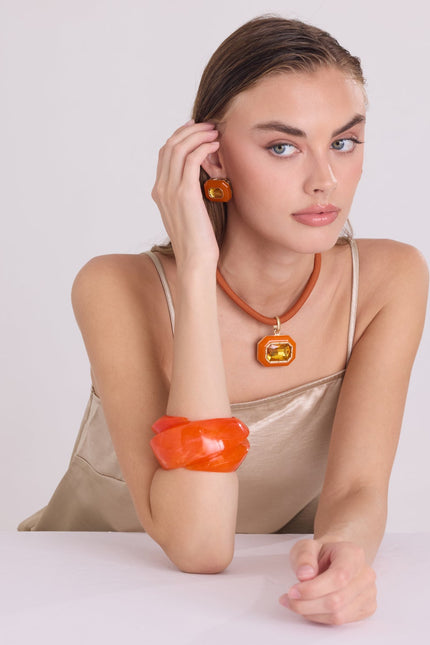 Brigite Polished Orange Resin Carved Bangle