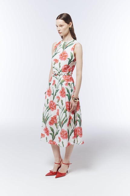 Side view of the SOUR FIGS Porcelain White carnation print dress styled for weddings and summer events.