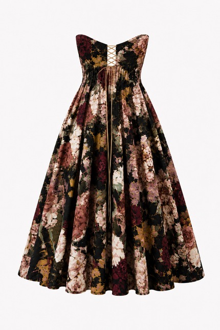 The Sarvin Golshifteh Floral Corset Midi Dress features a strapless design, dark floral print in burgundy, pink, green, and black, subtle ruching on the bodice, and a lace-up center accent for an effortlessly elegant look.
