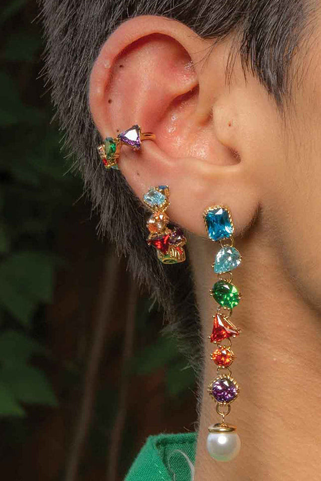 Close shot in which model is stacking Chromatic Cascade Ear Cuff  by Arvino with Same look of huggies earrings and dangles