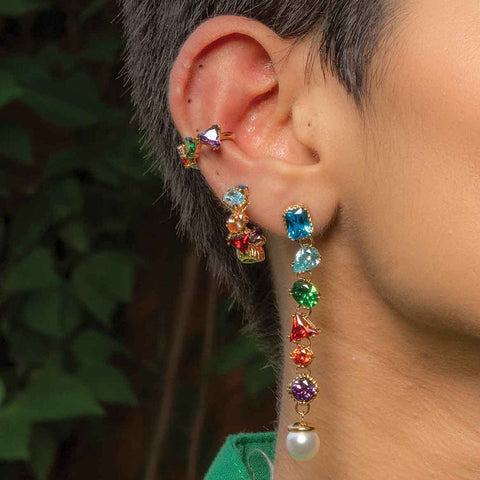 Close shot in which model is stacking Chromatic Cascade Ear Cuff  by Arvino with Same look of huggies earrings and dangles