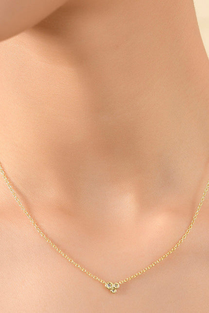 Close Shot Of Model Wearing Constellation Astrid Necklace By Arvino. Best CZ stone Gold plated Necklace.