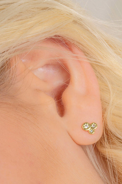 Close shot of Constellation Astrid Studs Earrings By arvino on model earlobe