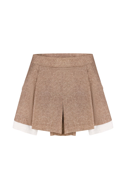 Cotton Mini Shorts are a playful yet refined essential for warm-weather styling.