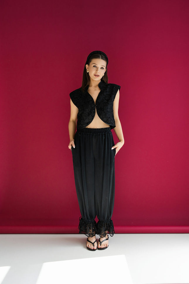 Maoconcept | Black cupro trousers with a lace ruffle