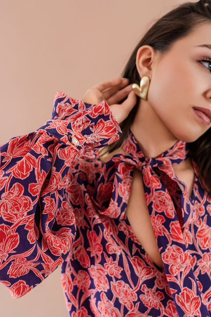 Maoconcept | Cupro shirt with a red floral print and a bow tie detail
