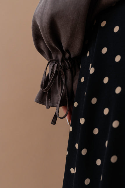 Maoconcept | Black polka-dot midi skirt with a slit