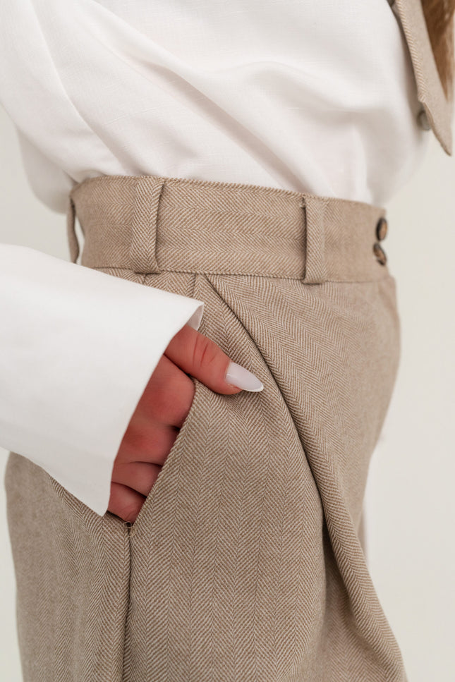 Maoconcept | Beige wool trousers with pleats and a herringbone pattern
