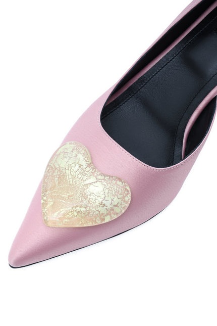 Close-up of handmade glass heart accessory with 24k white gold leaf on 5 cm stiletto heel