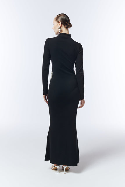 Elegant black floor-length dress with high neckline and crystal embellishments designed by SOUR FIGS.