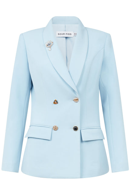 Light blue tailored blazer with statement buttons and flap pockets