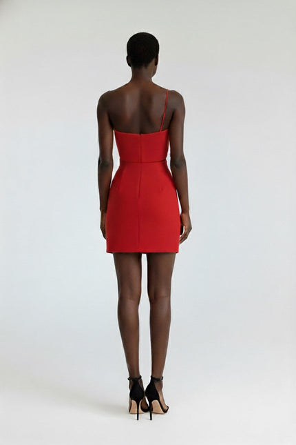 Red strapless dress worn by a model on a white background
