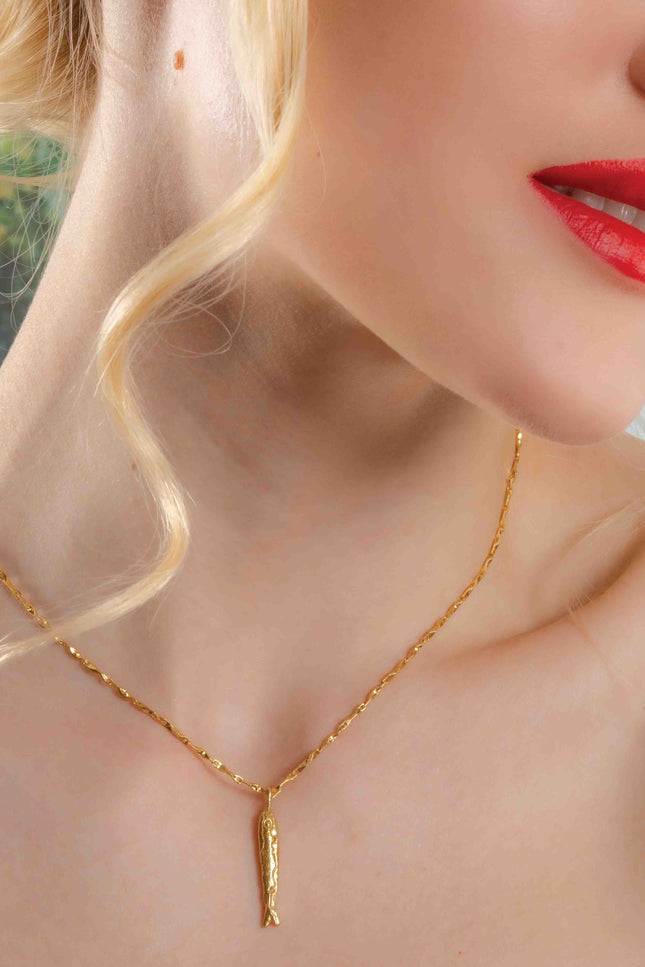 Model Wearing Fish Charm Necklace By Arvino. Premium 22kt Real gold Plating Necklace By Arvino