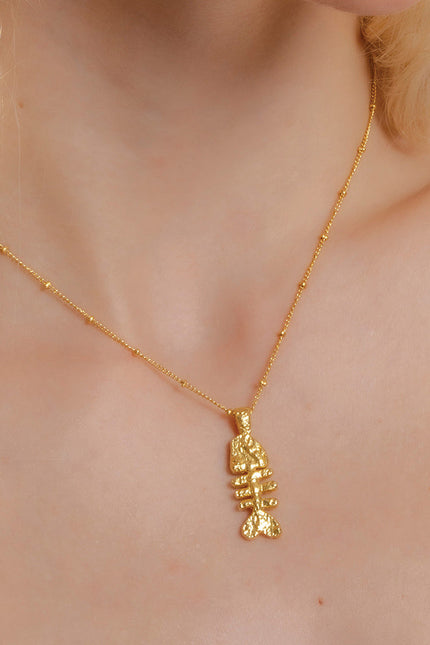 Fish bone necklace in 925 sterling and plated in 22kt real gold by arvino. Demi Fine jewellery By arvino