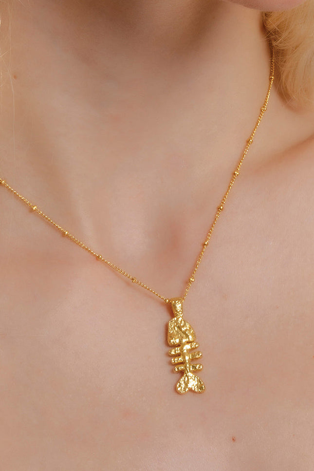 Fish bone necklace in 925 sterling and plated in 22kt real gold by arvino. Demi Fine jewellery By arvino