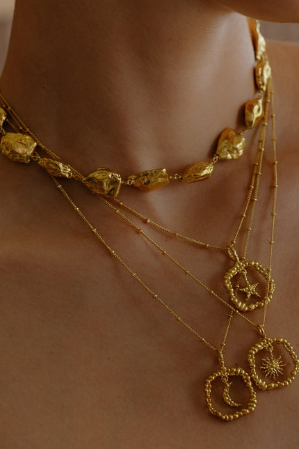 Model wearing a Stack of Gold plated Granulated Necklace By Arvino