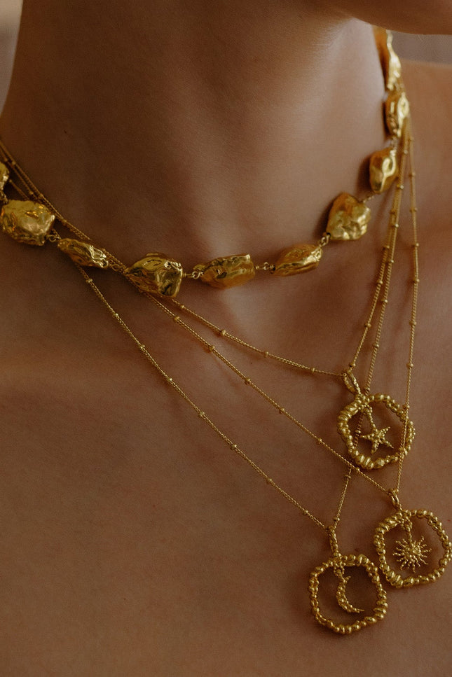 Model wearing a Stack of Gold plated Granulated Necklace By Arvino