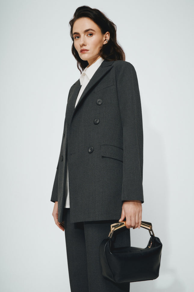 Oversized double-breasted jacket. Made of luxury deadstock fabric