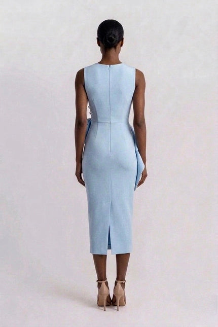 Light blue dress worn by a person on a white background