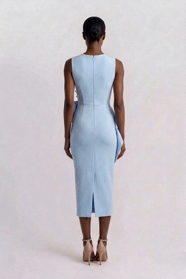 Light blue dress worn by a person on a white background