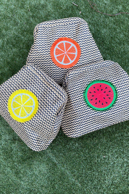 Lilly Loves fluffy lemon pouch clutch bag with soft, textured surface and zipper closure, ideal for casual or evening accessories.