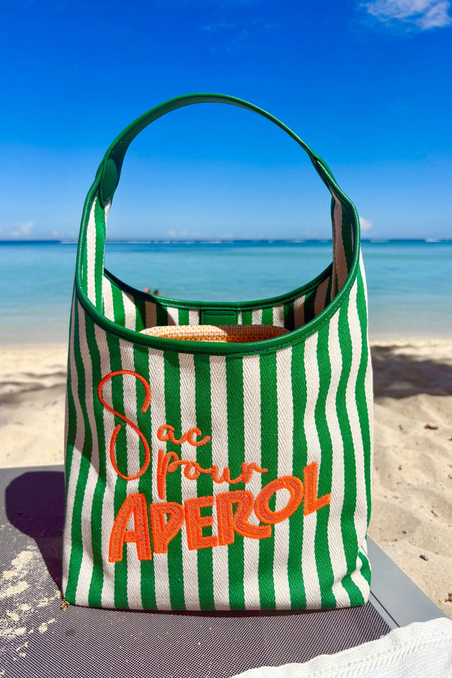 Lilly Loves Aperol Summer handbag with orange and white design, featuring a stylish hand strap and summer-themed details.